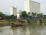 Leave the city behind and relax awhile, carried along the cool waters of the River Ping 