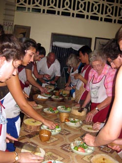 learn how to cook real Thai food in a traditional Thai setting.